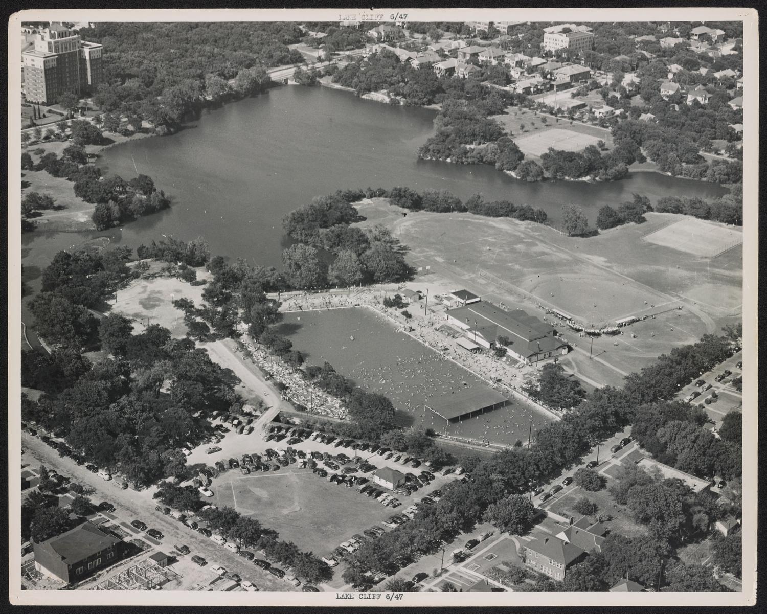 Wide angle view of Lake Cliff Park and pool from early 1900s